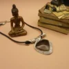 Collier ethnique métal couleur argent vieilli émail noir et strass blanc cordon noir