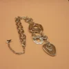 Collier géométrique style ethnique en métal argenté et bois