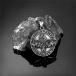 Pendentif viking acier or et argent loups et runes