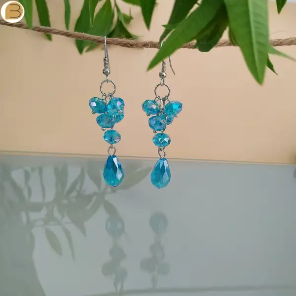 Boucle d'oreilles perles pendantes bleues sur crochet en acier inoxydable