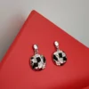 Boucles d'oreilles style géométrique moderne strass et email