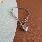 Bracelet acier inoxydable pendentif cœur bombé argent