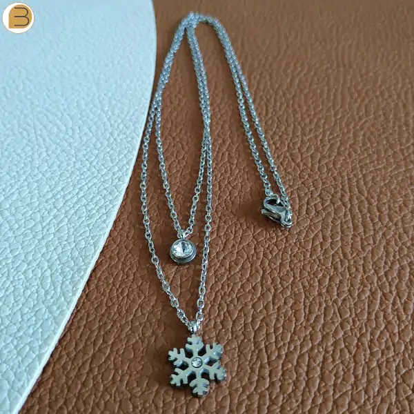 collier acier pendentif cristaux de neige et zircon