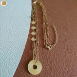 collier asymétrique acier doré pendentif cercle