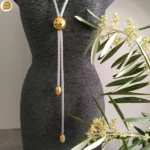 Collier long en acier chaine maille ronde perle ronde et perle olives acier doré
