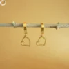 Boucle d'oreilles acier doré avec un pendentif cœur