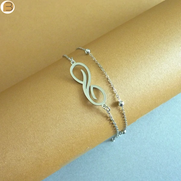Bracelet pendentif symbole de l'infini en acier inoxydable pour femme