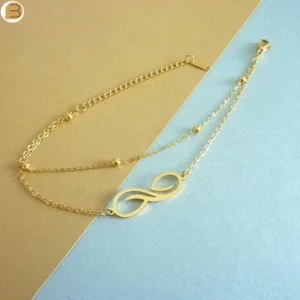 Bracelet pendentif symbole de l'infini en acier inoxydable doré pour femme