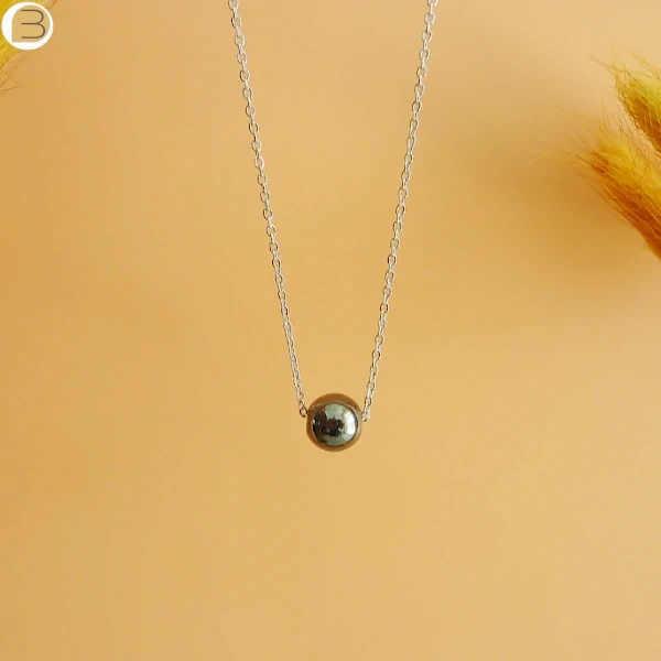 Collier acier mixte avec une perle ronde en hématite