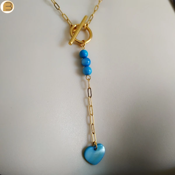 Collier acier inoxydable doré création exclusive en édition limitée perles et cœur de nacre bleue
