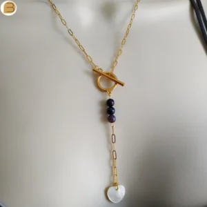 Collier acier inoxydable doré création exclusive en édition limitée perles noires et cœur de nacre blanche