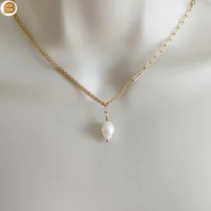 Collier pour femme en acier doré chaine asymétrique pendentif perle d'eau douce