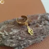 Bague réglable en acier inoxydable doré pour femme pendentif note de musique.