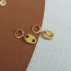 Boucles d'oreilles en acier inoxydable doré avec pendant grain de café