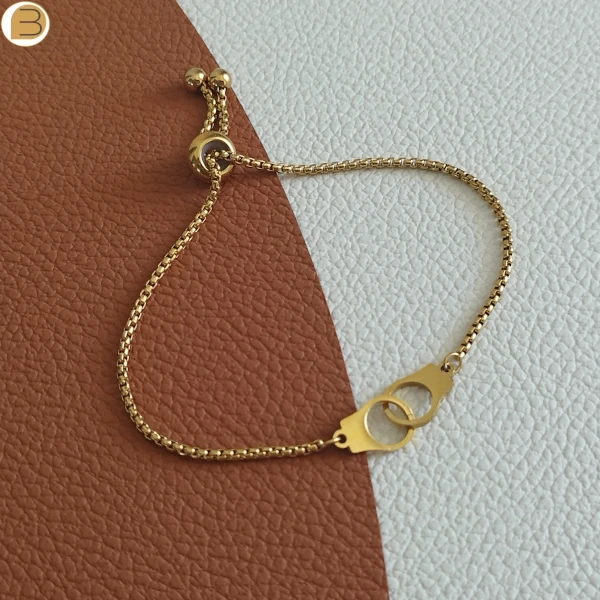 Bracelet réglable pour femme en acier doré menottes Création bijoutissimo