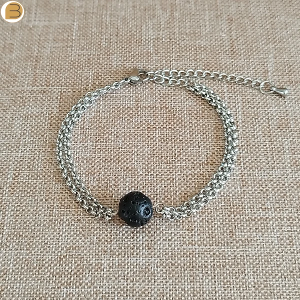 Bracelet pour femme en acier inoxydable double chaine perle en pierre de lave. Création bijoutissimo.