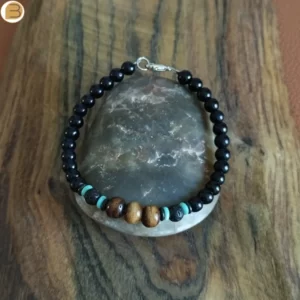 Bracelet unisexe en acier, perles bois, pierre de lave, turquoise, onyx noir. Création bijoutissimo