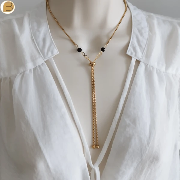 Collier acier inoxydable doré pour femme perles agates noires symbole infini perle acier réglable