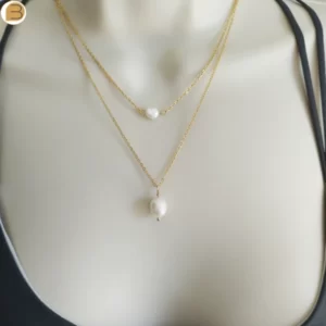 Création Bijoutissimo collier pour femme en acier doré double chaine perles d'eau douce