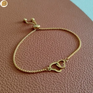 Bracelet réglable pour femme en acier doré cœur entrelacés Création bijoutissimo