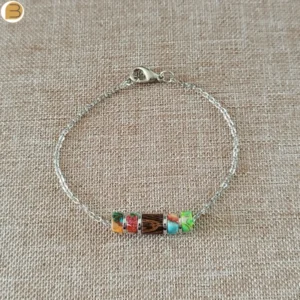 Bracelet acier doré avec ses perles en jaspe multicolore et ses perles acier