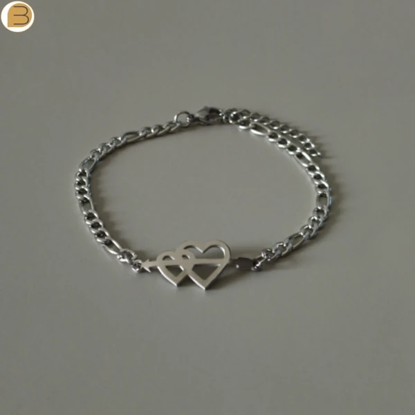 Bracelet en acier inoxydable double cœur, symbole de l'amour.